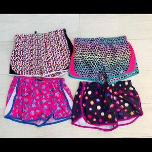 4 Pairs Running Athletic Shorts. Size L (10-12)